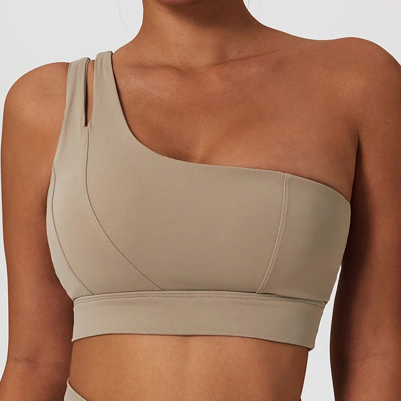 "Effortless Sophistication: The Elite One-Shoulder Sports Bra & Skirt Ensemble"